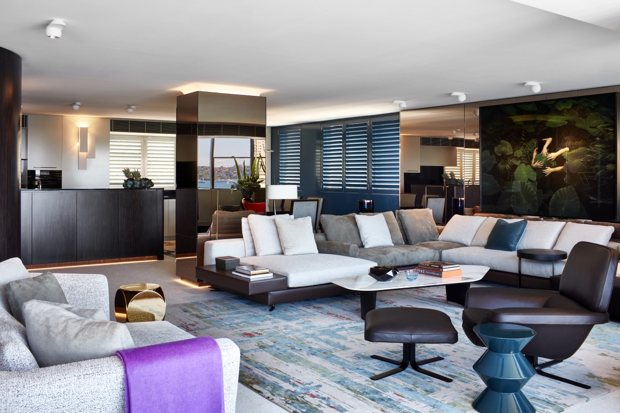 ​​​​​​​For this apartment’s transformative renovation, the front-of-kitchen cabinetry apartment, architecture, coffee table, couch, design, floor, furniture, home, apartment, interior design, lighting, living room, table, gray, black, Archer Design