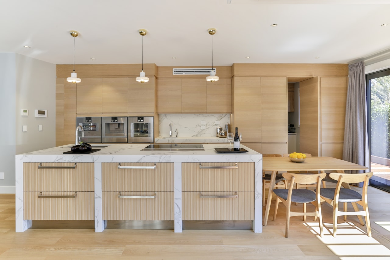 Natural-touch oak veneer on the perimeter cabinetry and architecture, cabinetry, countertop, cupboard, home, house, interior design, kitchen, lighting, tile, wood, wood flooring, oak, Matisse