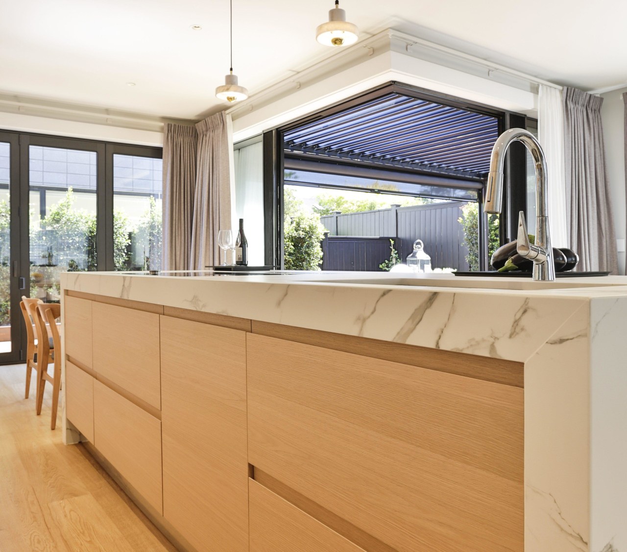 In the groove – recessed linear cabinet pulls architecture, building, cabinetry, ceiling, chest of drawers, countertop, cuisine classique, cupboard, drawer, floor, flooring, furniture, hardwood, home, house, interior design, kitchen, laminate flooring, lighting, material property, molding, plywood, property, real estate, room, window, wood, wood flooring, wood stain, orange, white