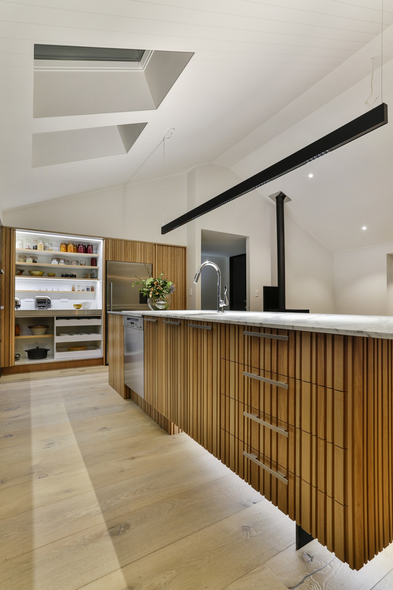 In this kitchen by designer Kira Gray, the gray, brown