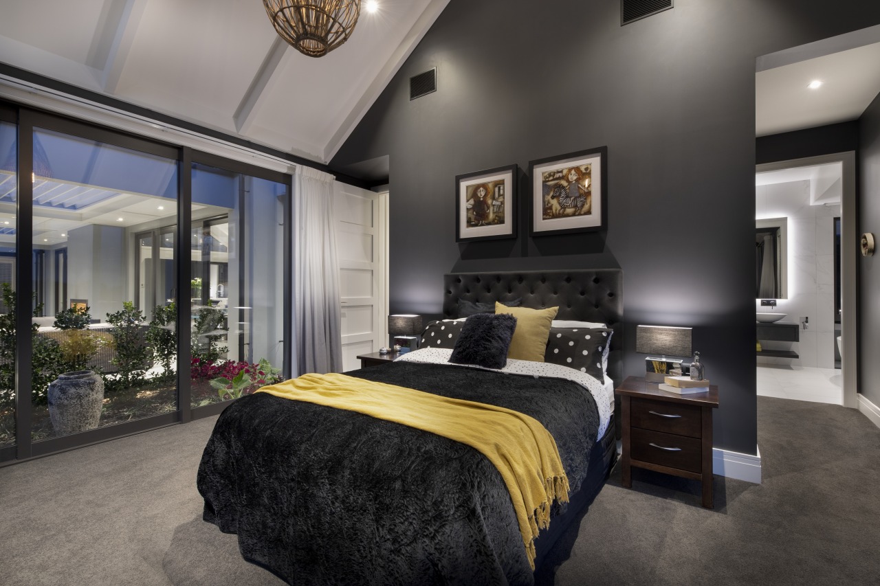 ​​​​​​​This large master suite includes a glass-walled bedroom, black, gray