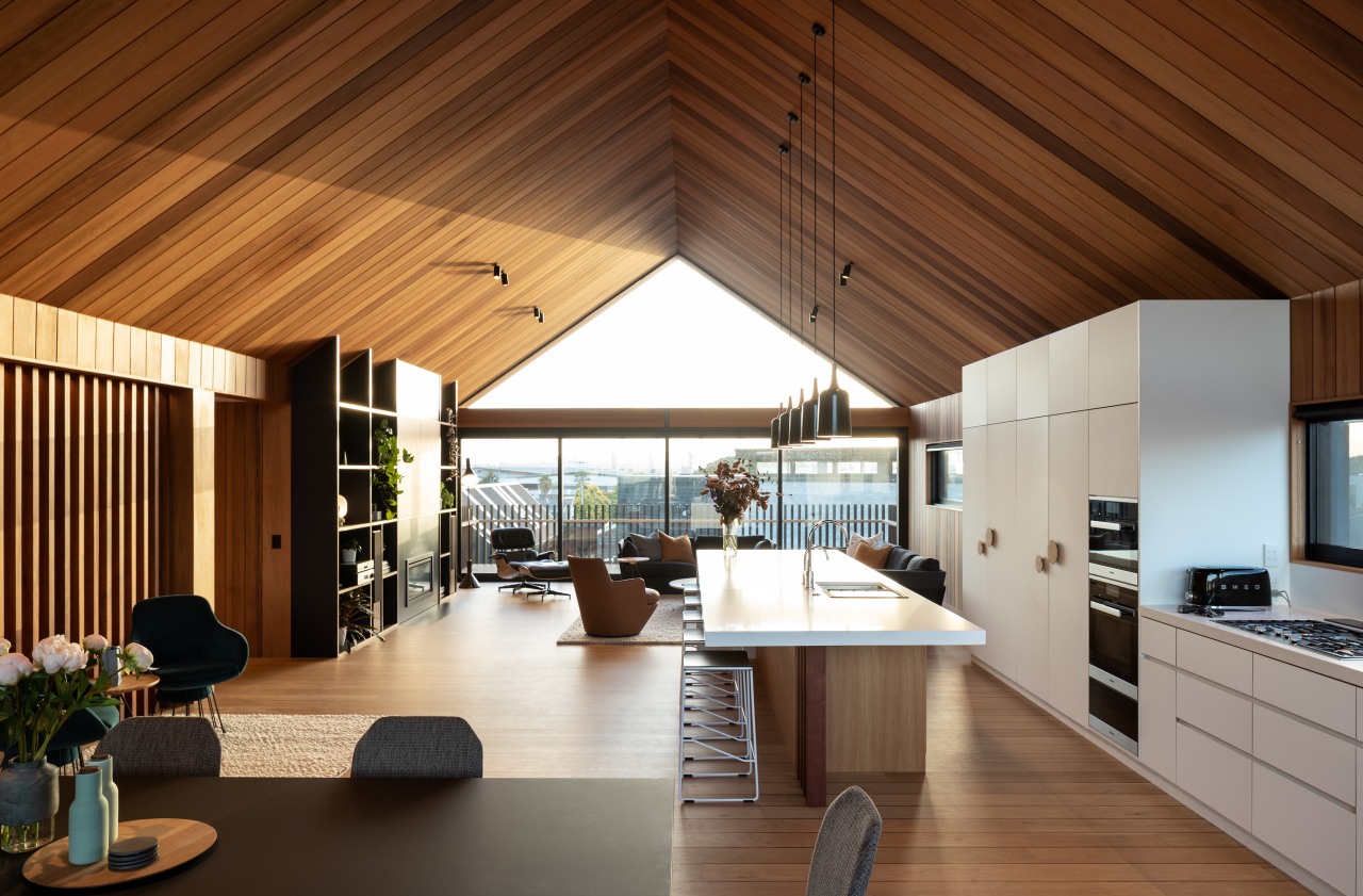 White kitchen cabinetry and a four-metre long Caeasarstone 