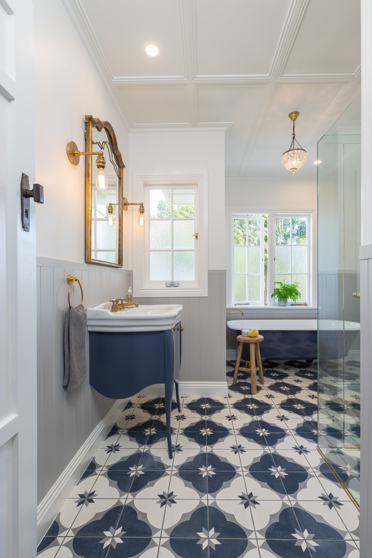 Let there be light – the original frosted architecture, bathroom, building, ceiling, daylighting, estate, floor, flooring, furniture, home, house, interior design, property, real estate, room, sink, tile, yellow, gray, brass, brass accents