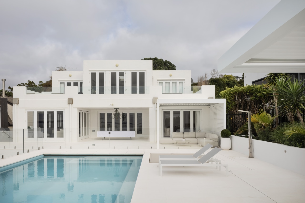 The pool and landscaping reflects a seamless flow 