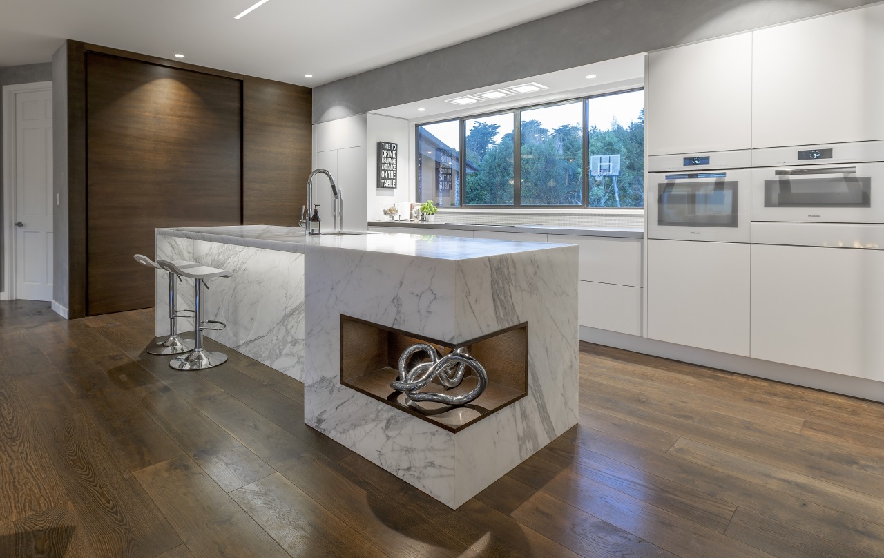 A timber-lined corner display niche in the island architecture, beige, building, cabinetry, ceiling, countertop, design, floor, flooring, furniture, hardwood, home, house, interior design, kitchen, living room, material property, property, real estate, room, table, tile, wood flooring, gray, brown