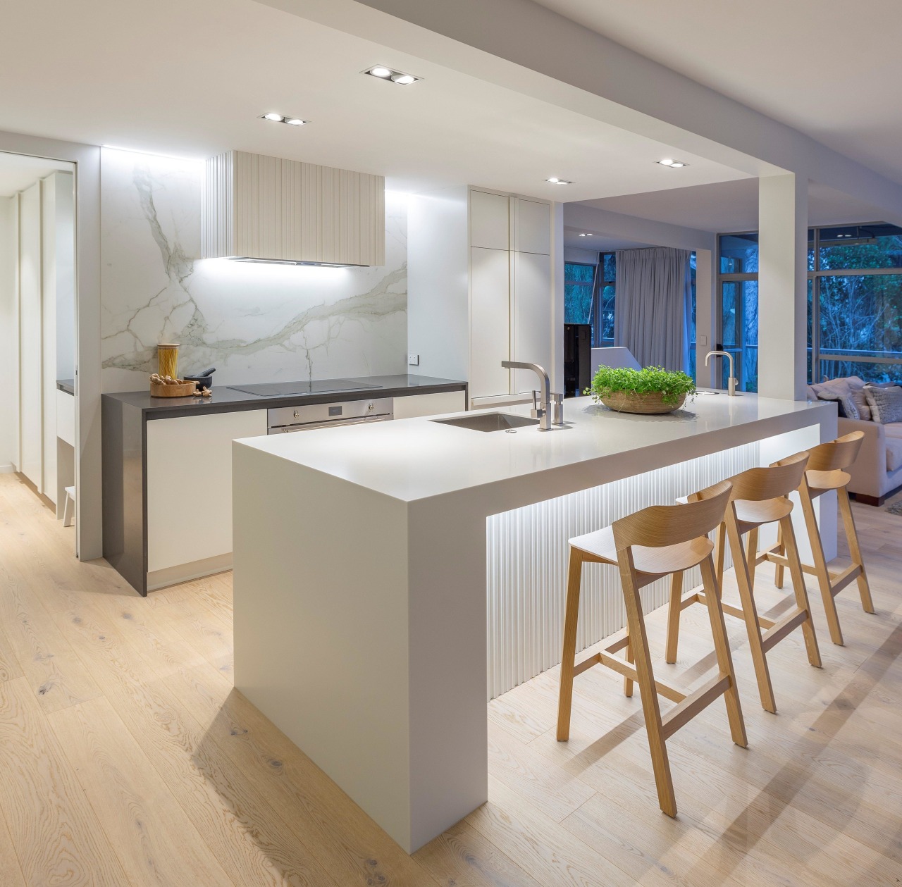 For this kitchen, the owners wanted a light, architecture, bar stool, building, cabinetry, ceiling, countertop, cupboard, design, dining room, floor, flooring, furniture, glass, home, house, interior design, kitchen, lighting, material property, property, real estate, room, stool, table, wood flooring, gray