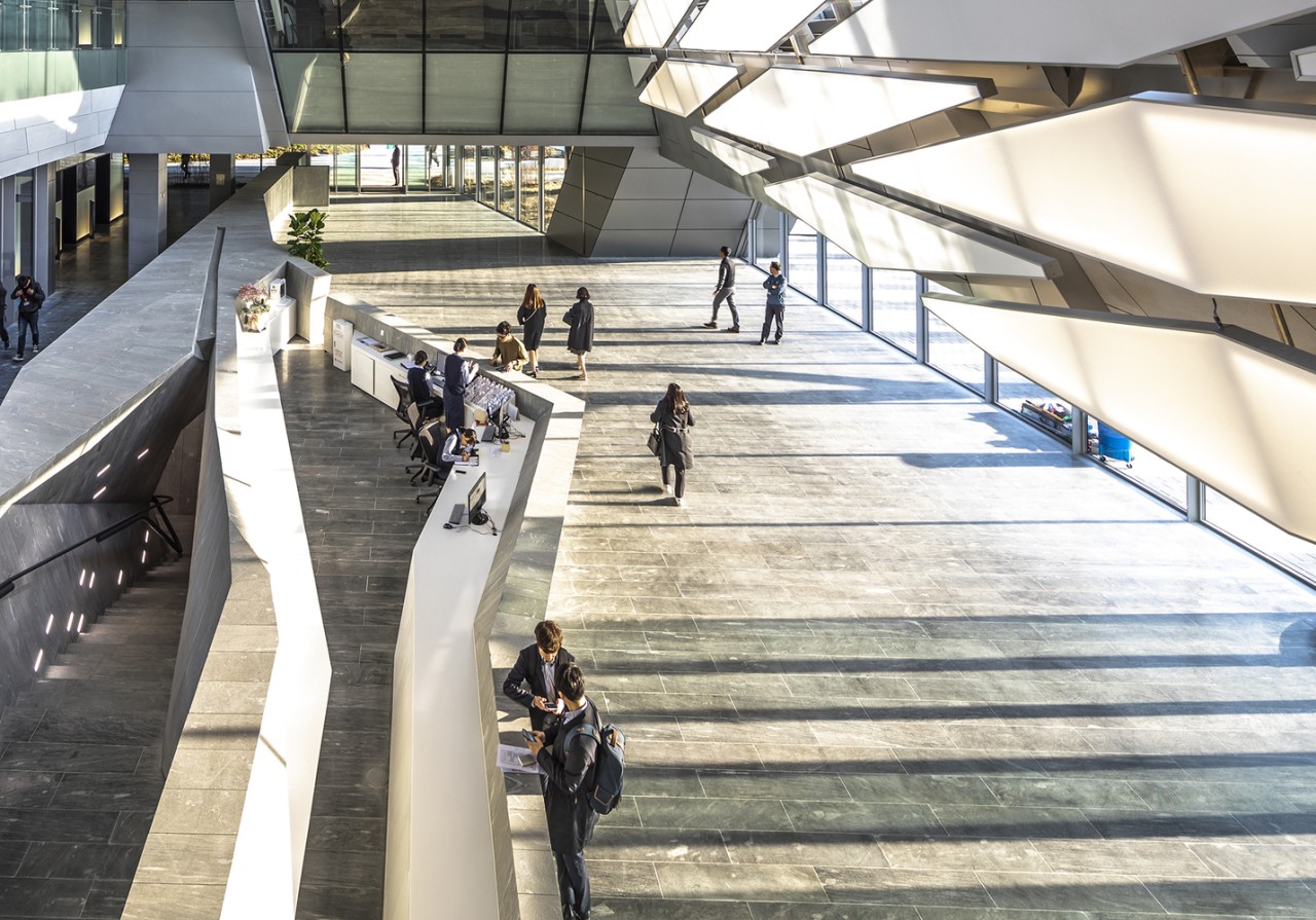 The Atrium serves as the Tower's social centre. architecture, building, structure, white, gray