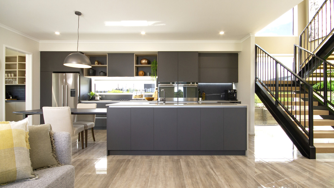 Refined matt cabinetry, a window splashback, generous island 