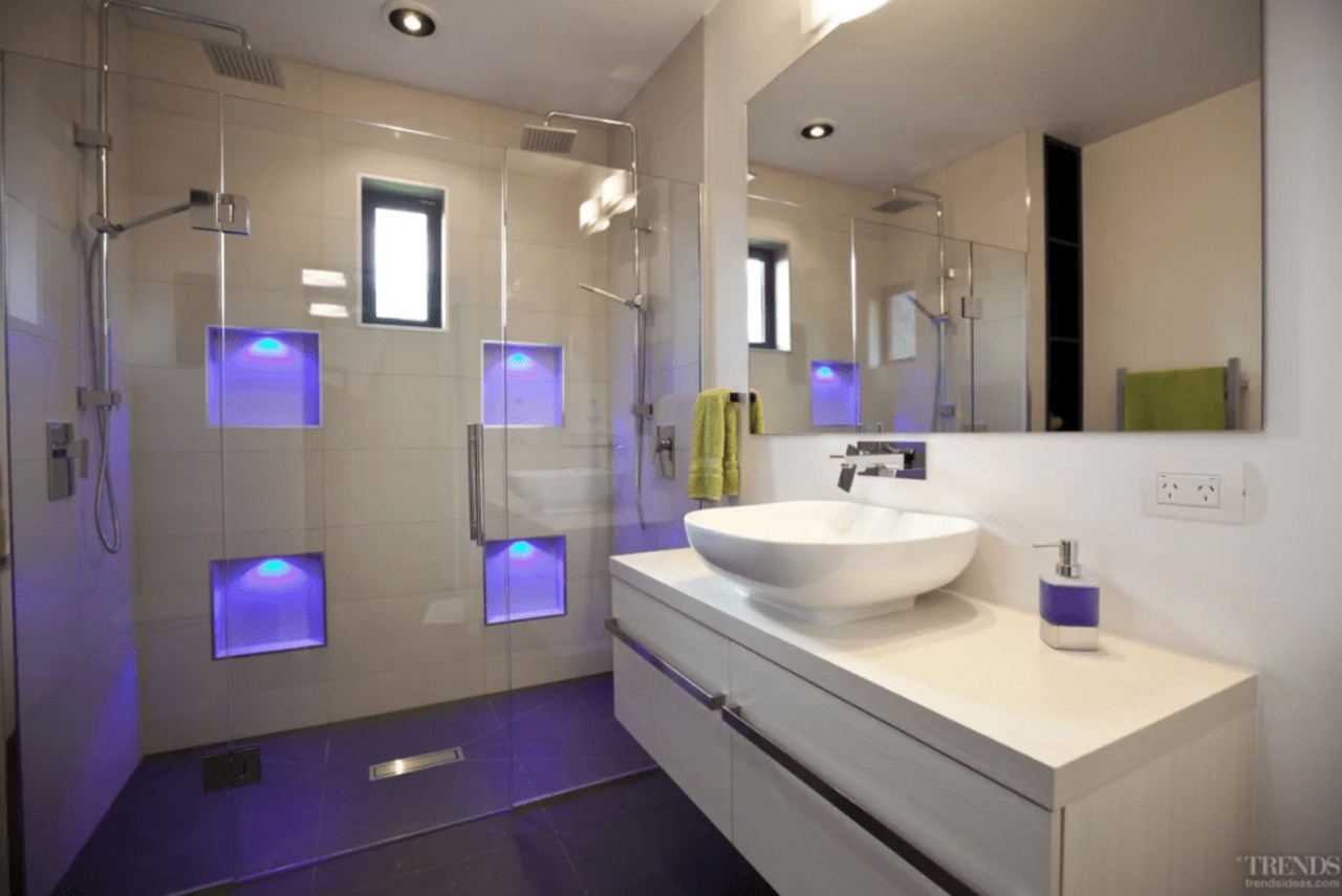 With LED strip lights hidden in the nooks bathroom, home, interior design, purple, real estate, room, sink, gray