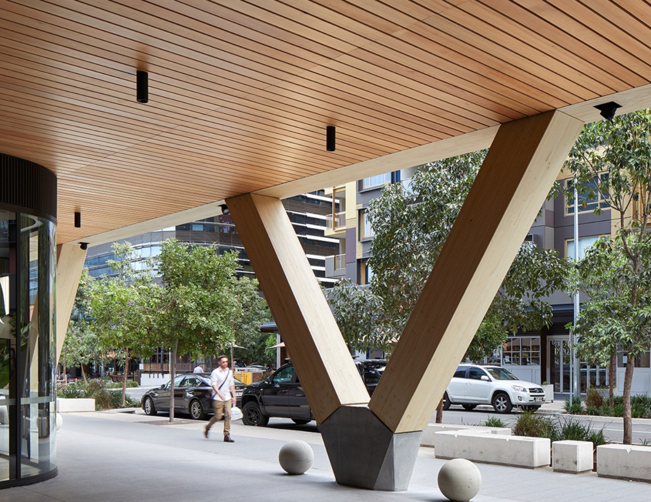 Raised on massive exposed timber v-columns and with architecture, structure, gray, brown