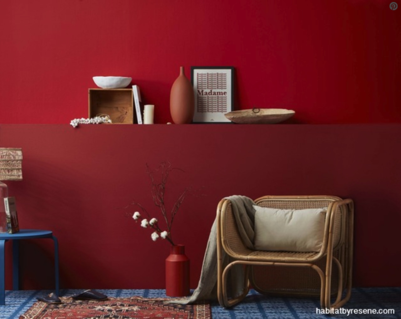 Two uplifting and cheerful reds have been cleverly furniture, interior design, red, room, shelf, shelving, table, wall, red