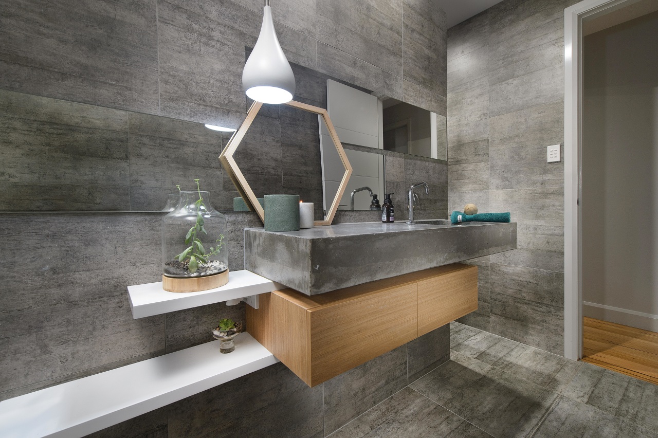 Strong, semi-industrial and minimalist, this family bathroom boasts architecture, bathroom, countertop, floor, flooring, interior design, sink, tile, gray