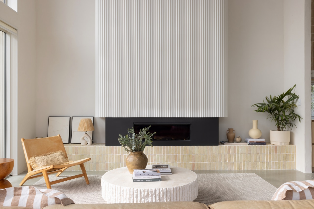 Fluting on the fireplace echoes a similar finish 