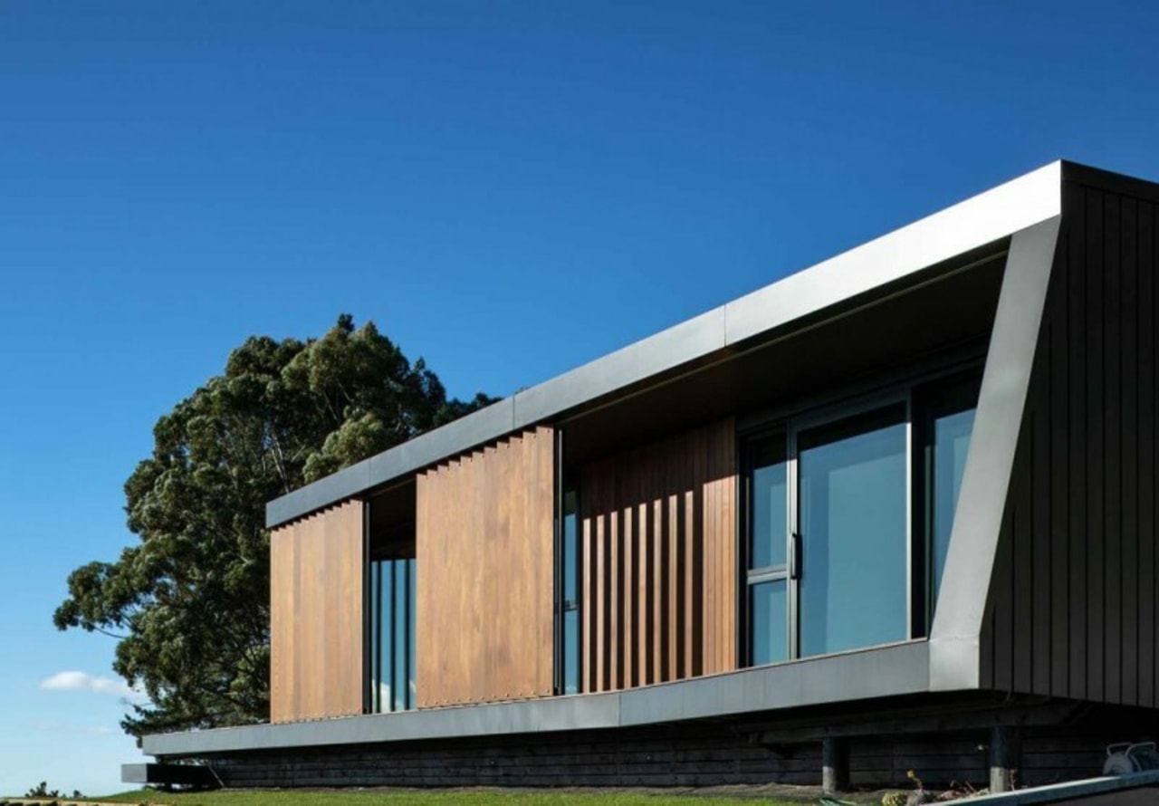 The building's elegant facade. - Overlooking beautiful Tasman 