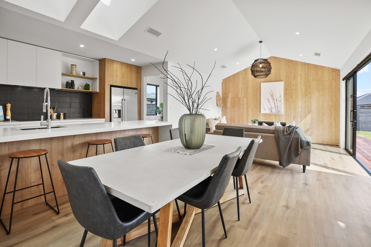 The open-plan entertainer’s wing includes a modern wood 