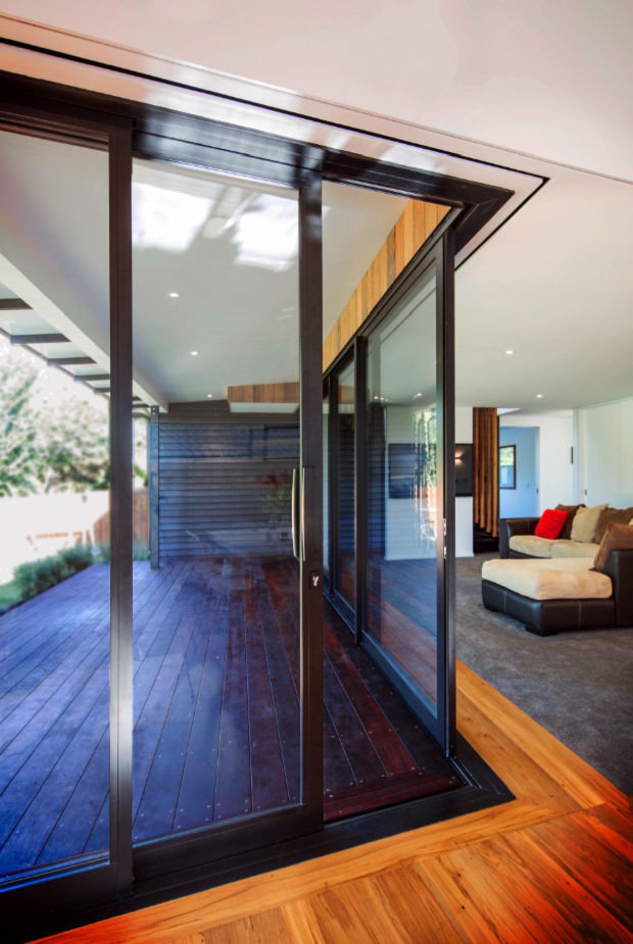 View out onto the deck architecture, daylighting, door, floor, glass, hardwood, house, interior design, real estate, window, wood, wood flooring, gray