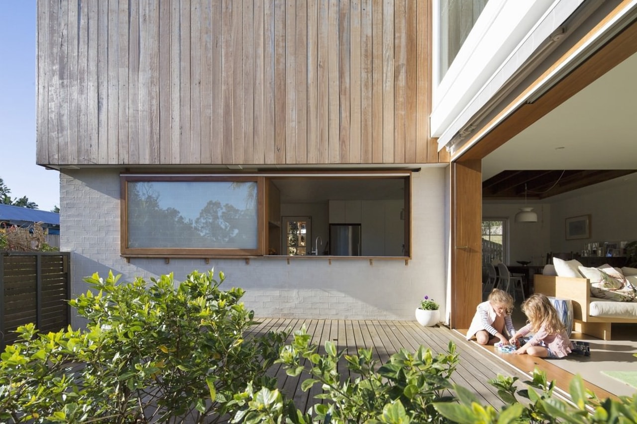 The living room flows out onto the deck architecture, daylighting, facade, home, house, interior design, real estate, roof, window, gray