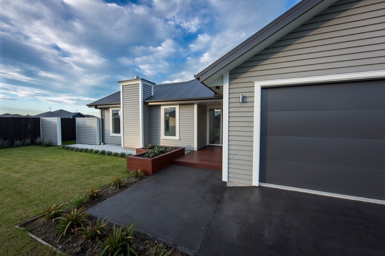 Running the fence in line with the house cottage, facade, home, house, property, real estate, residential area, siding, yard, black, gray