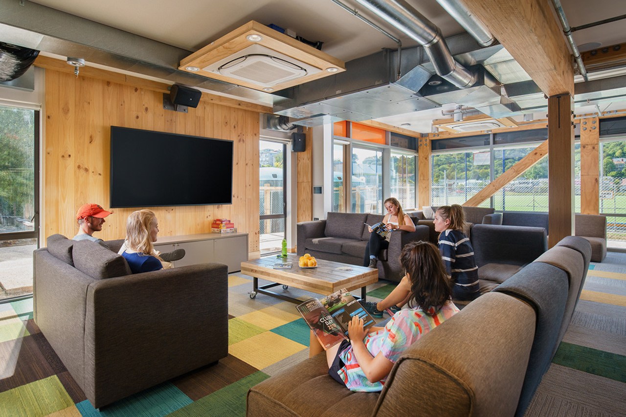 Exposed services become a prominent design feature in interior design, living room, real estate, gray, black