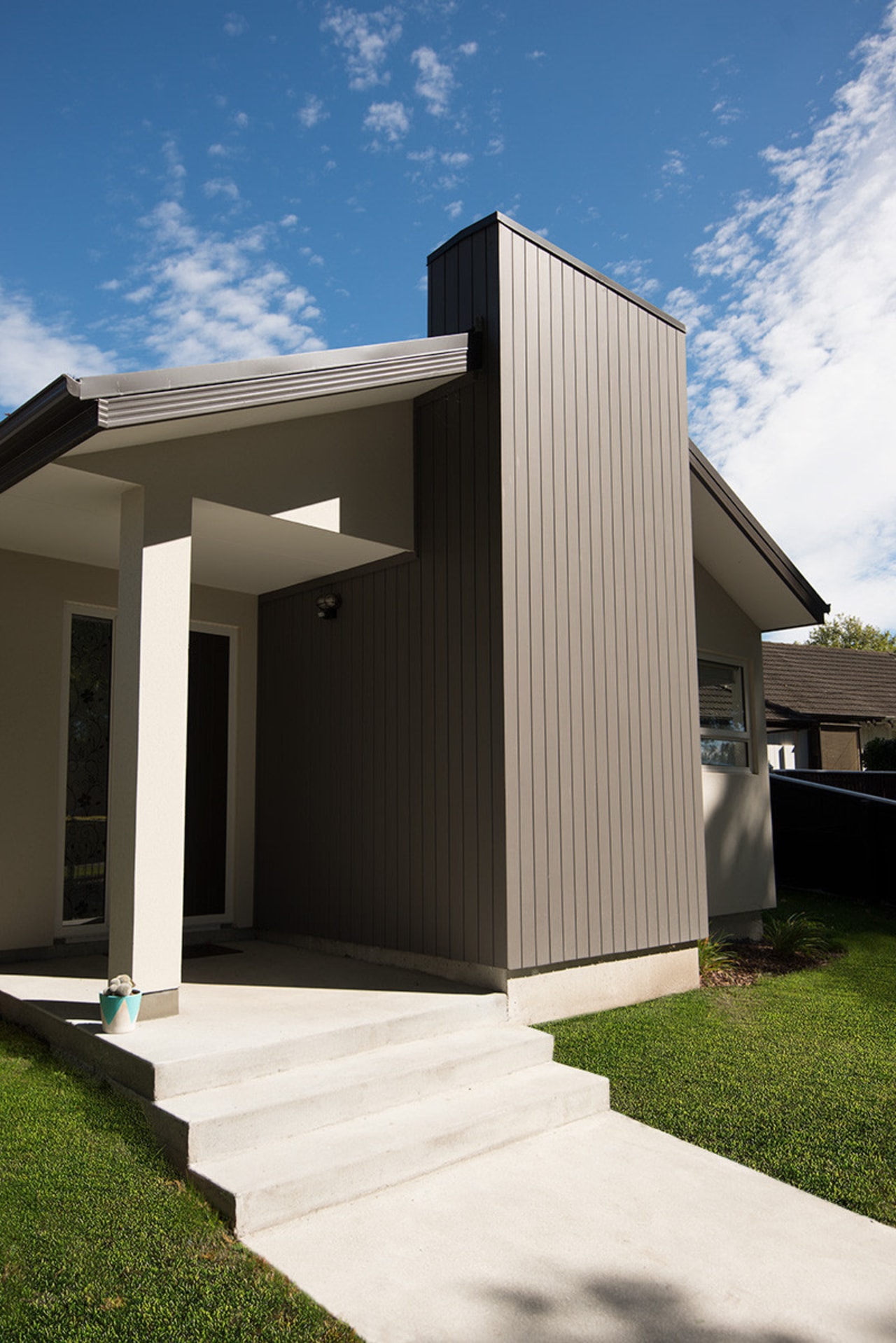 Vertical shiplap timber weatherboards by Niagara architecture, building, elevation, facade, home, house, real estate, residential area, siding, sky, white