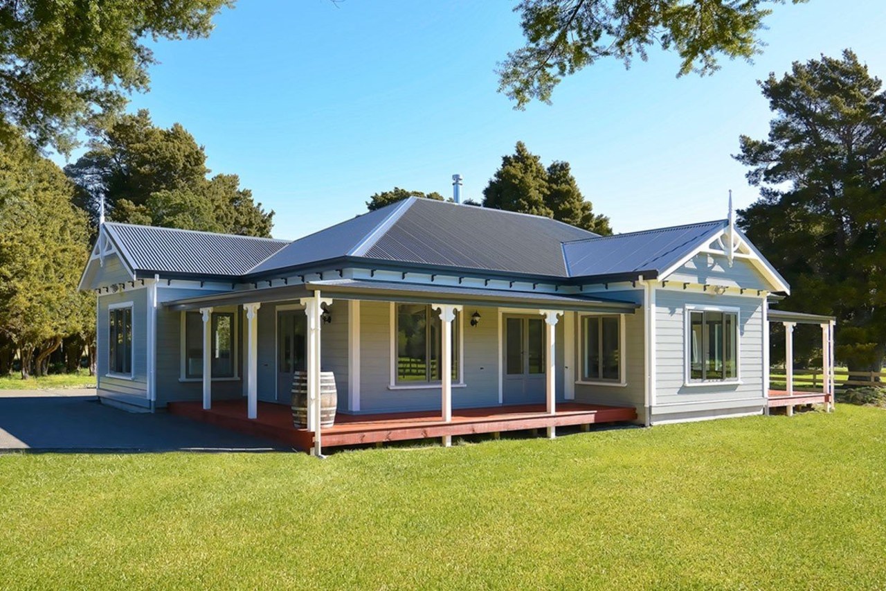 At a classic style Envira weatherboard house. cottage, elevation, estate, facade, farmhouse, home, house, property, real estate, siding