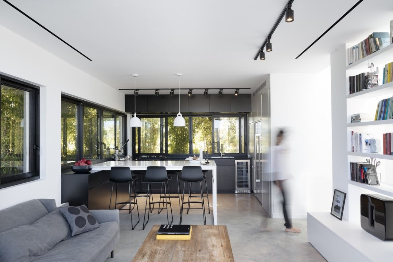 The kitchen flows into the living area house, interior design, living room, property, real estate, white