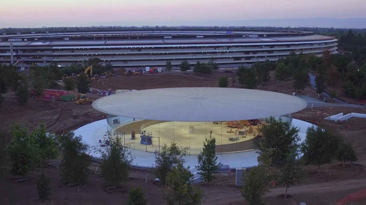 The new Steve Jobs Theater sits beneath the structure, water, water resources, black, blue