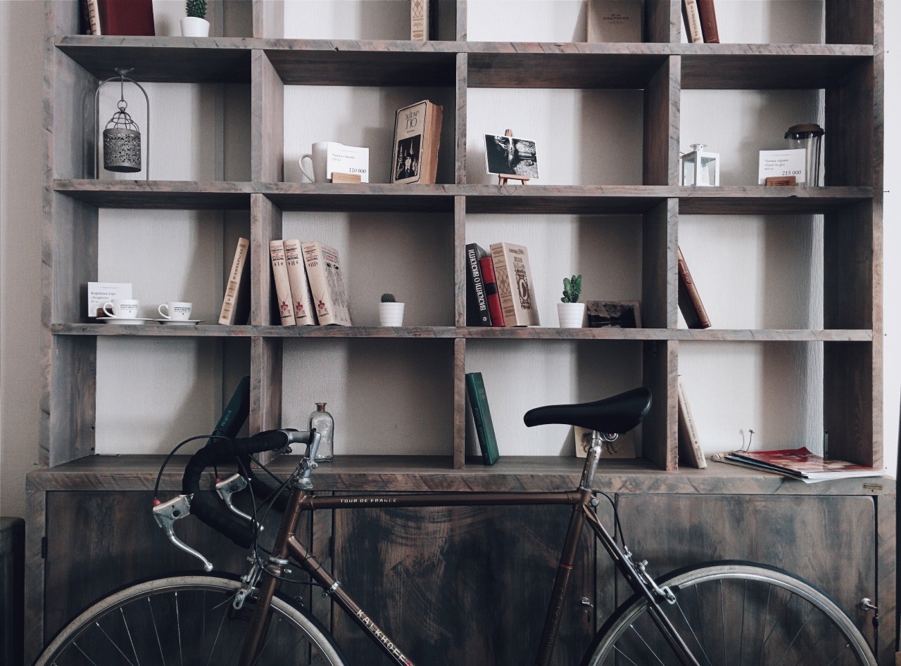 Photo by Roman Mager on Unsplash bookcase, furniture, shelf, shelving, black, gray