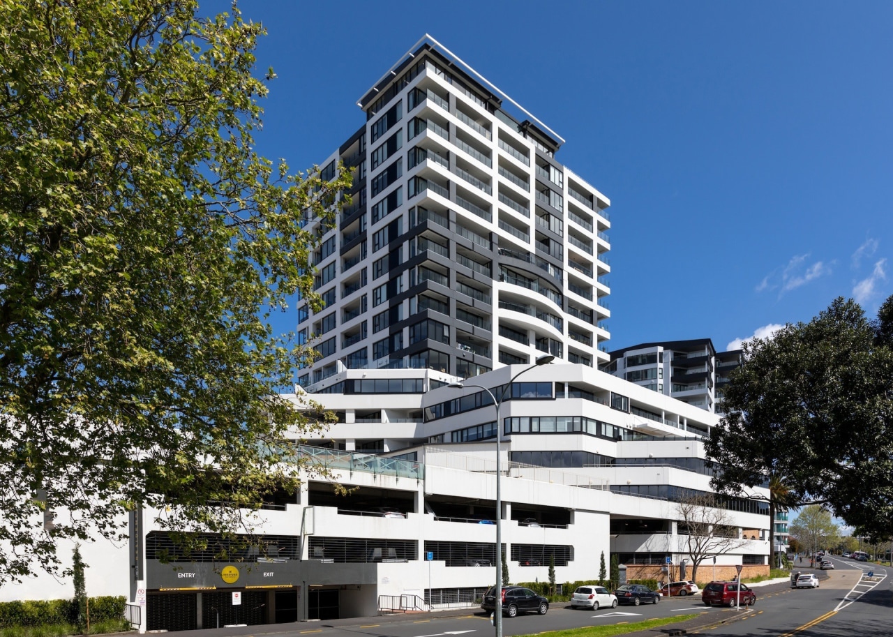 The TIDA NZ Architect-designed apartment winner – Paul apartment, architecture, building, city, commercial building, condominium, corporate headquarters, daytime, facade, headquarters, hotel, house, metropolis, metropolitan area, mixed use, neighbourhood, property, real estate, residential area, tower block, blue