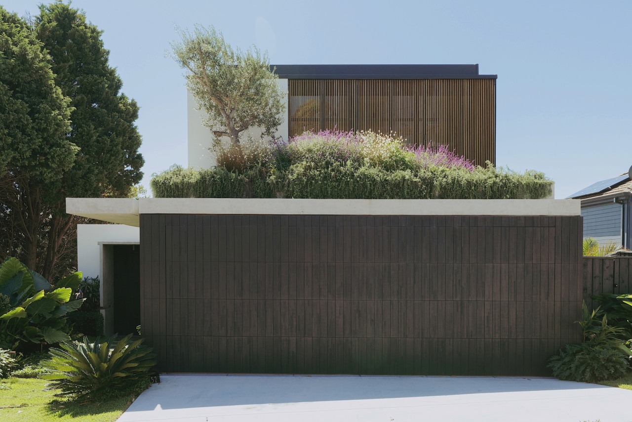 The understated, mid-level street facade. - Conceal, direct 