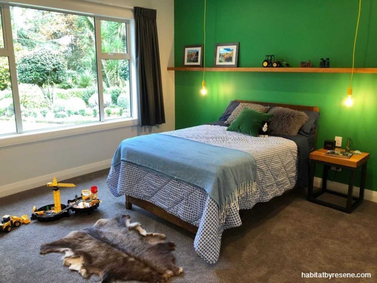 Five-year-old Tom wanted to bring the John Deere bed, bed frame, bed sheet, bedding, bedroom, building, ceiling, duvet cover, floor, flooring, furniture, green, hardwood, home, house, interior design, linens, mattress, nightstand, property, real estate, room, textile, wall, wood, green