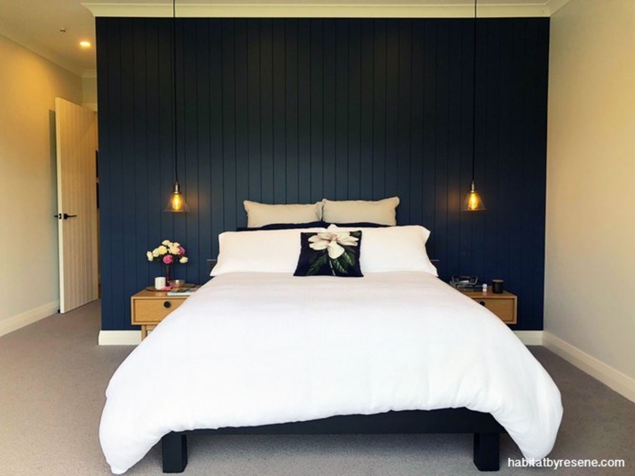 Gemma chose Resene Dark Side for the feature bed, bed frame, bed sheet, bedding, bedroom, boutique hotel, building, ceiling, comfort, design, duvet cover, floor, furniture, interior design, lighting, linens, mattress, mattress pad, property, real estate, room, suite, textile, wall, black, white