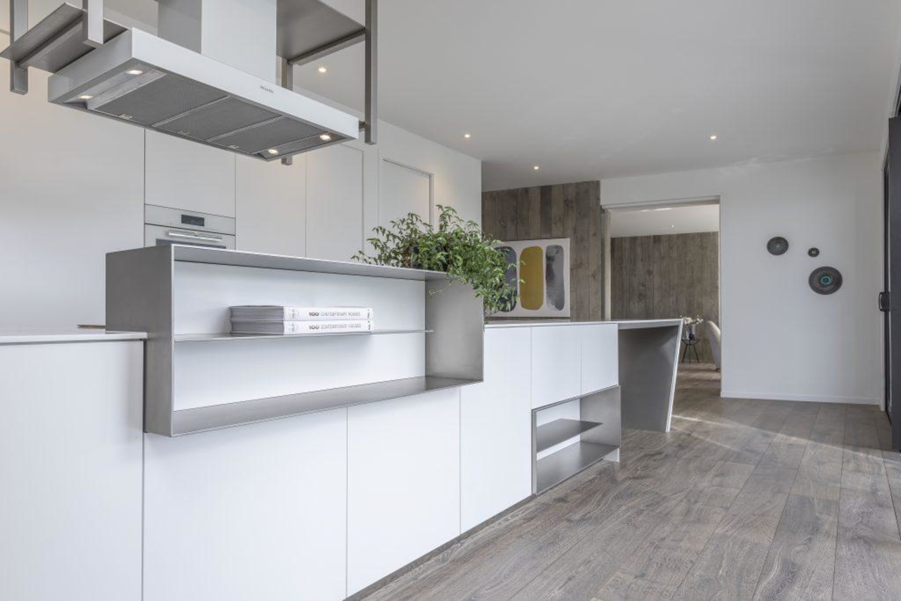 A closer look at the geometric kitchen island architecture, countertop, floor, interior design, kitchen, real estate, gray, white