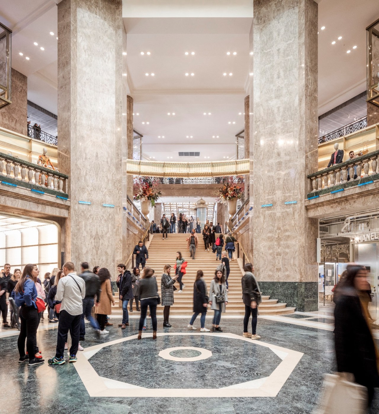 A grand staircase, which doubles as an auditorium architecture, building, city, interior design, lobby, shopping, shopping mall, tourism, gray