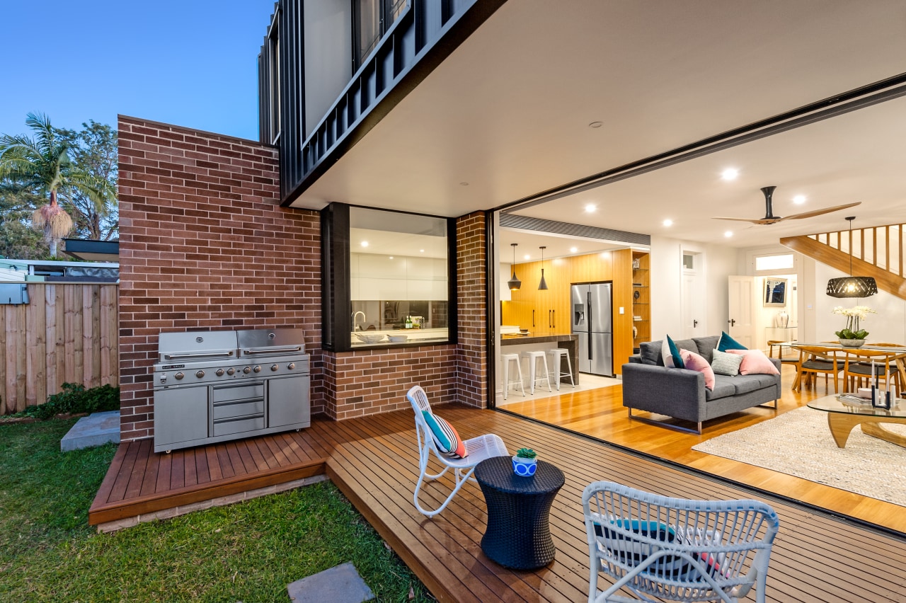 Dilapidated Victorian home receives contemporary open-plan addition estate, home, house, interior design, living room, patio, penthouse apartment, property, real estate, orange