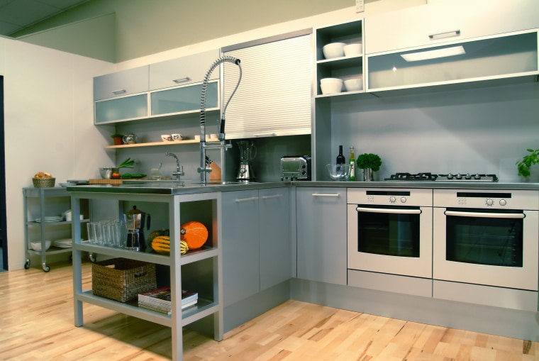 A semi-industrial looking kitchen featuring the latest Bosch countertop, home appliance, interior design, kitchen, orange, gray