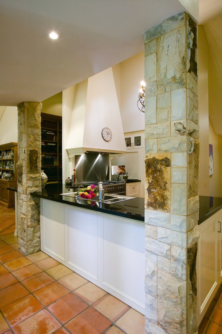 view of this kitchen with a french influence cabinetry, countertop, floor, flooring, interior design, kitchen, room, brown, gray