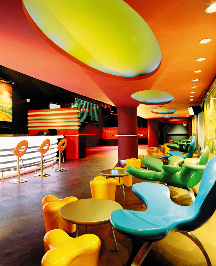 view of the interior of the zouk nightclub interior design, restaurant, table, yellow