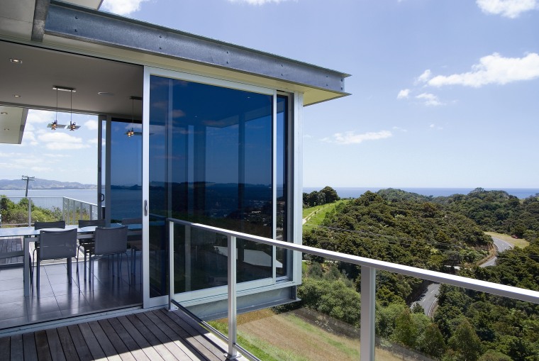 View of the living areas in this matapouri cottage, home, house, property, real estate, sky, window, teal