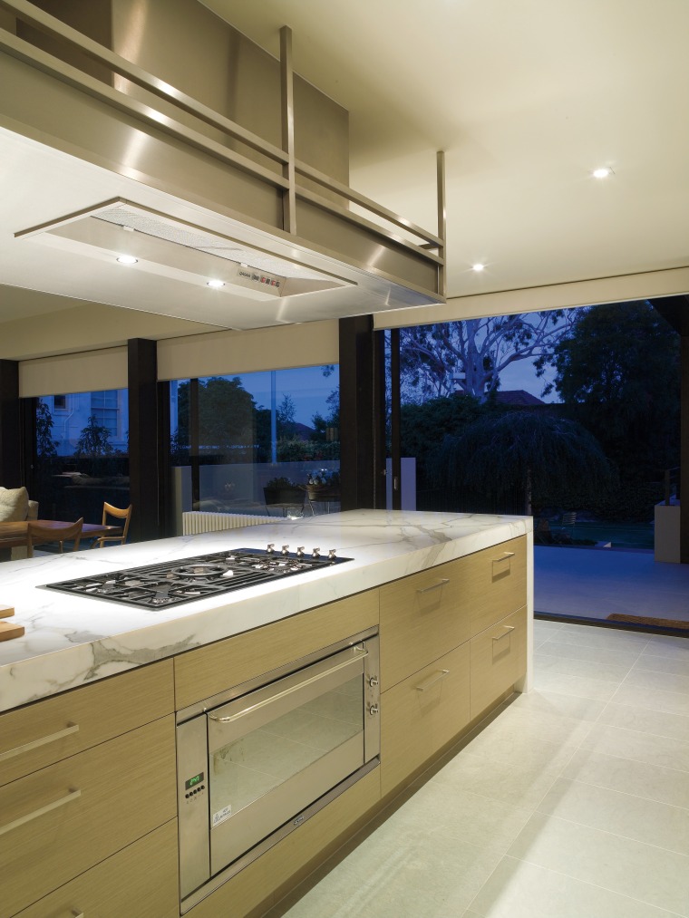A view of this kitchen featuring clalcutta marble cabinetry, countertop, interior design, kitchen, gray, brown