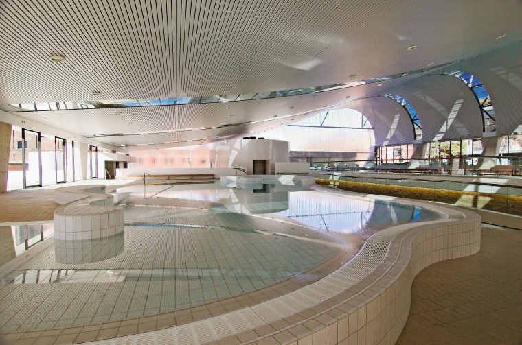 An interior view of the ian thorpe aquatic architecture, leisure, leisure centre, swimming pool, tourist attraction, gray