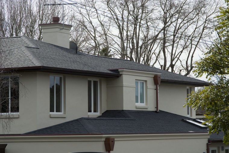 The Antique Black shingles on this house are building, daylighting, facade, home, house, outdoor structure, property, real estate, residential area, roof, siding, window, gray, black
