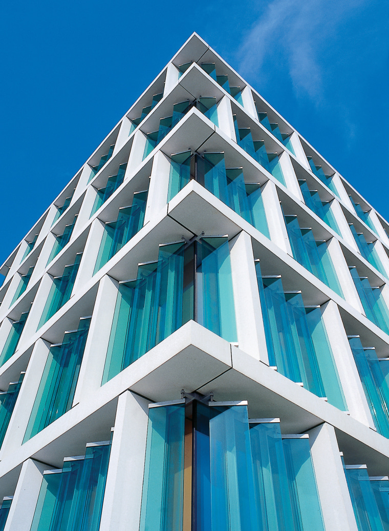 Colt Tolfab offers a range of sunshades and angle, architecture, blue, brutalist architecture, building, commercial building, condominium, corporate headquarters, daylighting, daytime, elevation, facade, headquarters, landmark, line, sky, skyscraper, structure, symmetry, tower block, teal, blue