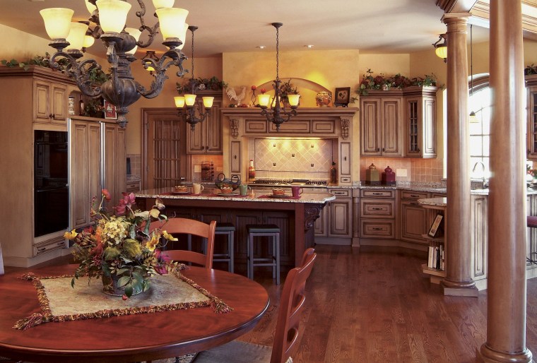 view of kitchen fefaturing cabinetry, wooden floors, cabinetry, countertop, cuisine classique, dining room, furniture, home, interior design, kitchen, living room, room, wood, red