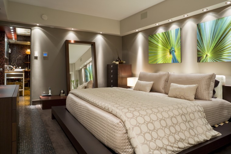 View of the master bathroom which features extensive bed frame, bedroom, ceiling, interior design, room, suite, wall, brown, gray