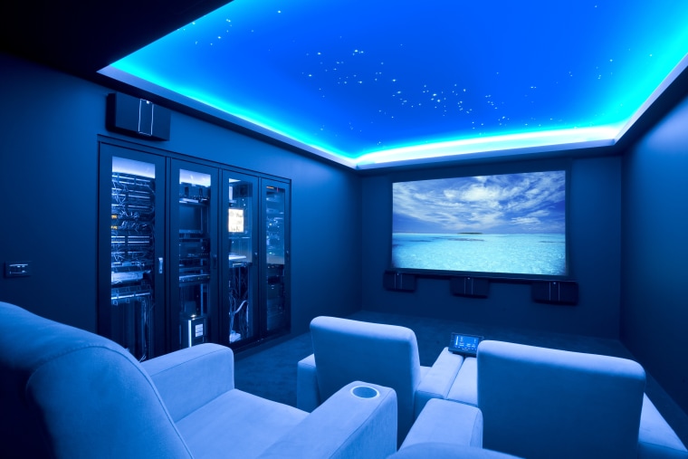 View of home cinema with projector screen, audiovisual blue, ceiling, display device, interior design, lighting, room, technology, blue