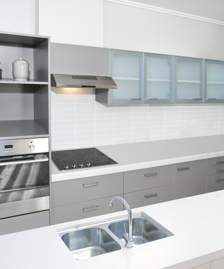 view of a kitchen which features Oliveri's new countertop, kitchen, kitchen stove, product, product design, white, gray