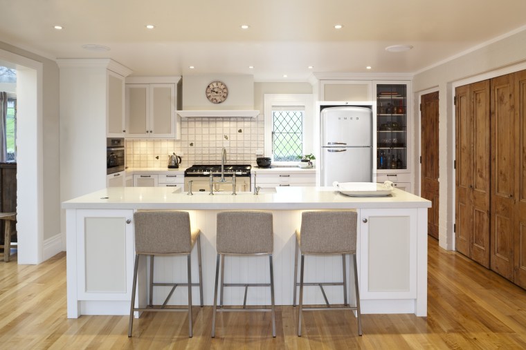 View of a traditional-styled kitchen which features timber cabinetry, countertop, cuisine classique, floor, flooring, hardwood, interior design, kitchen, real estate, room, wood flooring, gray