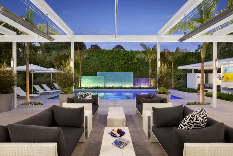 Place furniture and accessories to suggest how certain estate, interior design, property, real estate, resort, villa, gray