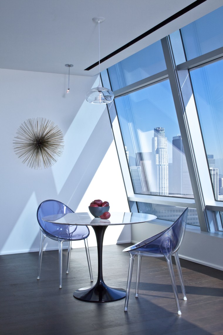 Kartell Philippe Starck chairs are teamed with a architecture, chair, daylighting, furniture, glass, house, interior design, product design, table, window, teal, gray